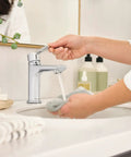 Flute Bathroom Faucet Chrome Finish No Fuss 4-Inch Installations Fits 1 Or 3 Hole Setups ADA Compliant, shown in use