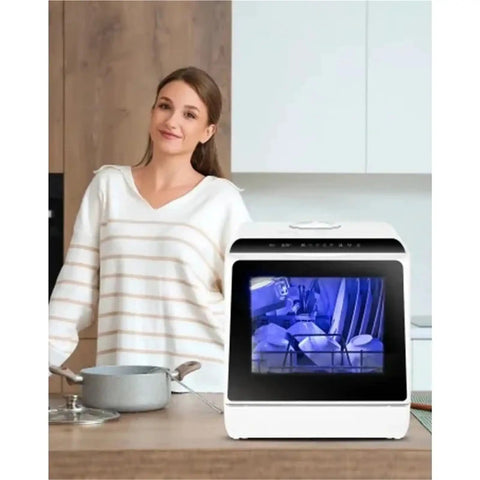 Totally Game Changing Compact Dishwasher With Built In Water Tank Featuring One Touch Start And Quick Wash Cycles To Deliver No Sweat Cleaning For Tiny Kitchens And Hectic Apartment Life Today on kitchen counter with woman.