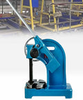 Heavy Duty Cast Iron Arbor Press Machine With Solid Base, blue color, 20kN capacity, precision stamping tool in a workshop setting.
