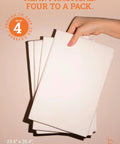 Hand holding set of four 23.6" x 35.4" Serious Absorption Handles Every Mess Waterproof Adult Bed Pads for protection.