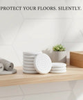 Stack of Eight Pack White Square Furniture Leg Pads 1.18 Inch PVC Floor Protectors for Chairs on a shelf