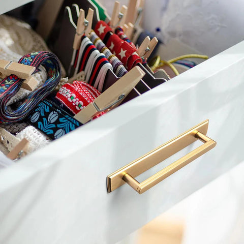 Close-up of 2 Pack 5 Inch Center To Center Champagne Bronze Cabinet Handles With Backplates for modern kitchen drawers