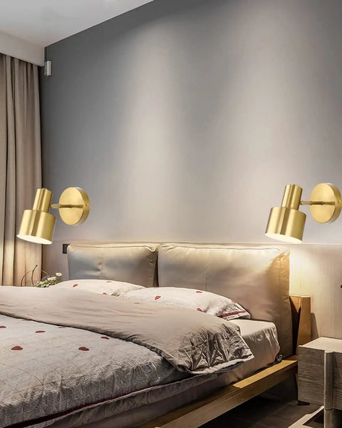 Two Pack Gold Industrial Wall Sconces With Adjustable 280 Degree Tilt And 180 Degree Swing E26 Vintage Brass Vanity Lamps mounted on wall above bed