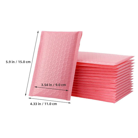 Stacked pink bubble mailers, self-seal padded envelopes 11x15cm, shown with dimensions, product: Pink Bubble Mailers 60 Pack Self Seal Padded Shipping Bags 11x15cm Adhesive Envelopes For Safe Budget Friendly Package Mailing And Small Business Shipments.