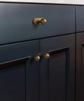Antique Brass Cabinet Knob With Backplate Set, 24mm Diameter Zinc Alloy Hardware, installed on dark kitchen cabinet