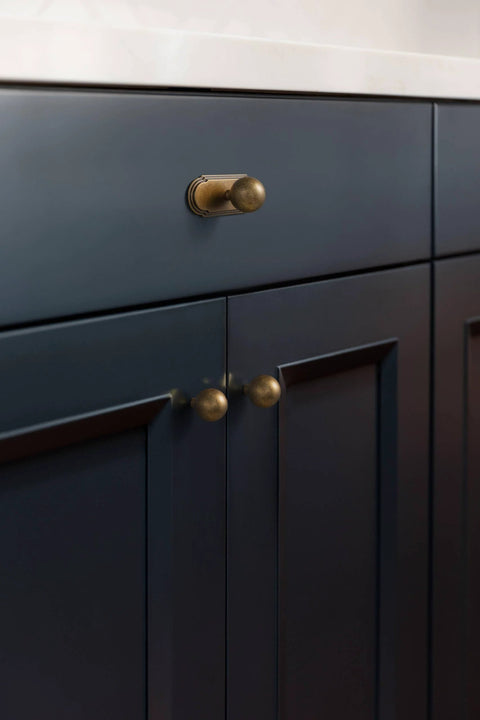 Antique Brass Cabinet Knob With Backplate Set, 24mm Diameter Zinc Alloy Hardware, installed on dark kitchen cabinet