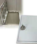 Straight Up Heavy Duty Steel Concealed Cellar Door With Smooth Hydraulic Glide And Ergonomic Handle For Effortless Floor Access, showing open hatch in tile floor.