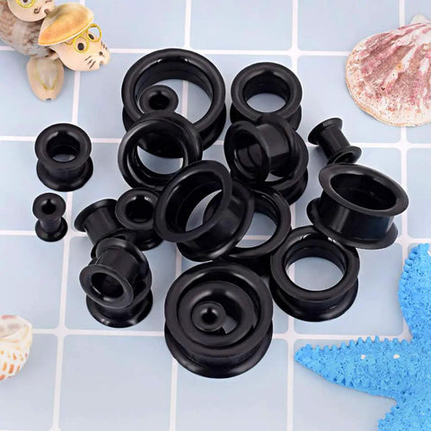 20 Piece Silicone Ear Tunnels Kit From 2G To 1 Inch Gauges Plugs Expander Set For Piercing And Stretching displayed on tiles