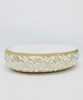 Real Deal Oval Vessel Sink, Solid Ceramic Bathroom Basin With Sleek Gold Finish, modern oval bowl showing floral design and shiny glaze.