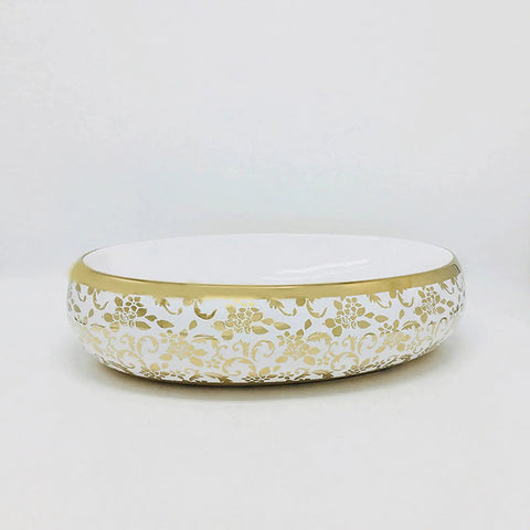 Real Deal Oval Vessel Sink, Solid Ceramic Bathroom Basin With Sleek Gold Finish, modern oval bowl showing floral design and shiny glaze.