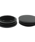 Paquete de 4 tapones Inch de plástico Inch 5 Inch con extremos negros para tubos redondos, en el que se muestran dos tapones de plástico negros, uno al lado del otro.