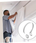 60 Pack Plastic Curtain Rings For Rods Thick Durable Construction With Smooth Glide For Heavy Curtains, man installing