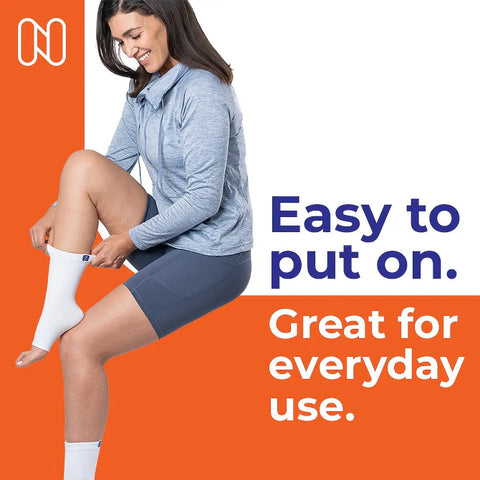 Woman wearing toeless compression socks for neuropathy relief and plantar fasciitis, unisex medium white, ankle support.