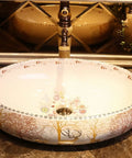 USZWBY Vessel Sinks Bathroom Vessel Sink Forest Art Countertop Basin Nordic Ceramic Washbasin Utensils with Faucet Bathroom Bowl Sink, round sink with floral design.