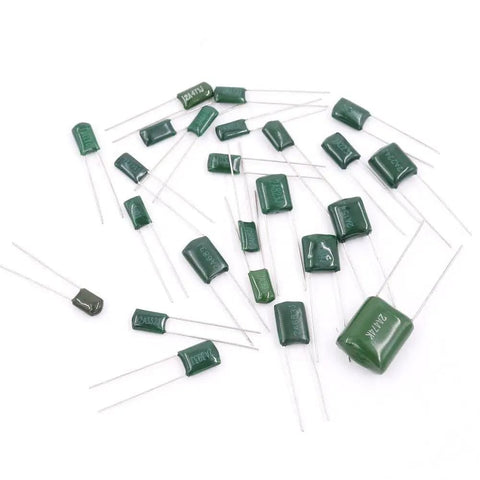 Dope Mylar Film Capacitor Kit With 700 Pieces And 24 Values From 0.22nF To 470nF At 100V Tolerance 5 Percent green capacitors scattered