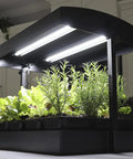 All In One Indoor Garden Kit With Dual T5HO Grow Lights And NanoTech Reflectors Auto Watering Mat Heavy Duty Base in kitchen