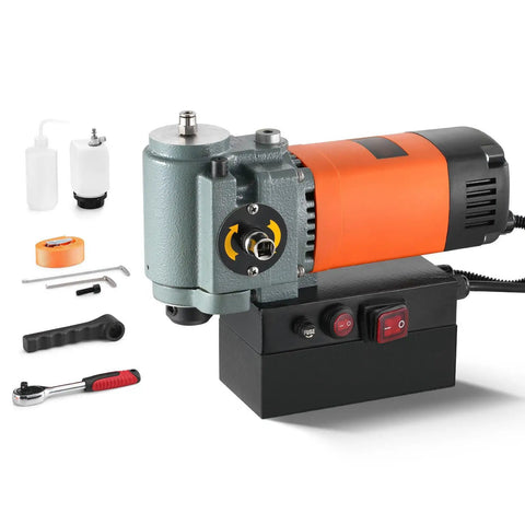 Rock Solid 1300W Portable Magnetic Drill Press With Integrated Cooling, Compact Low Profile Body, Beast Mode 10000N Base close-up view with accessories.