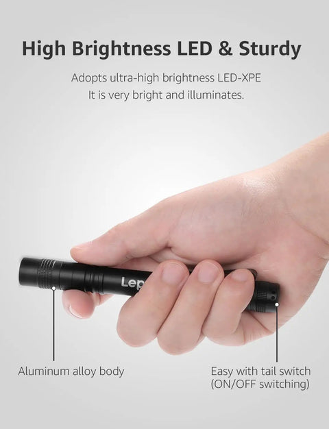 Hand holding Ultra Bright LED Pen Flashlights Mini Pocket Lights with Clip 2 Pack Waterproof for Inspection, Work, and Emergency Use