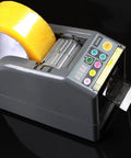 Automatic Tape Dispenser And Heavy Duty Cutting Machine With Bright Led Digital Panel, showing yellow tape roll and control panel.