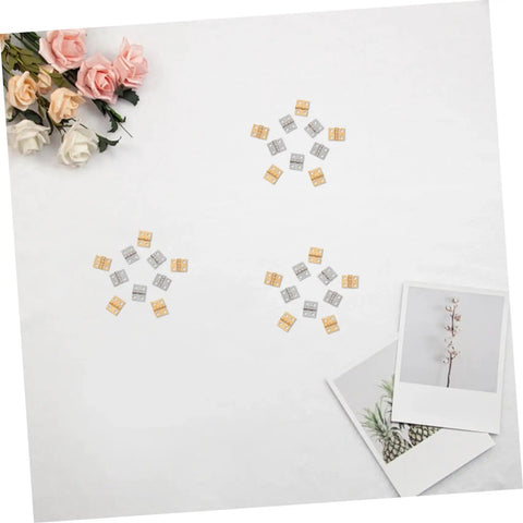 Copper Mini Hinges For Craft Projects And Jewelry Boxes, 100 Pack arranged in a star pattern on a white background
