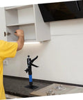 Heavy Duty Telescopic Cabinet Lift Jack With Adjustable Support Pole For Quick Wall Setup and Rock Solid Furniture Raising In Kitchens Bathrooms Or Garages holding kitchen cabinet in place.