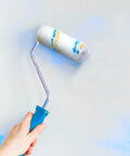 Bulk Pack 100 Mini Paint Roller Covers 6 Inch For Quick Home Painting DIY Projects shown applying paint on wall
