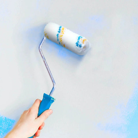 Bulk Pack 100 Mini Paint Roller Covers 6 Inch For Quick Home Painting DIY Projects shown applying paint on wall