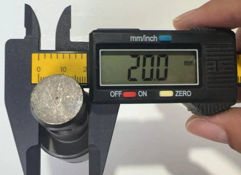 Caliper measuring 20mm bore of 7/8 Inch Female To 3/4 Inch Male Earth Auger Adapter With Guide Pin For Power Drill Bits
