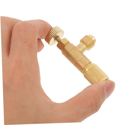 Two Piece R410 To R22 Adapter Valve Core Removal Kit For Refrigeration Service And Electric Vehicle Charging Gear offering heavy duty brass construction, held in hand.