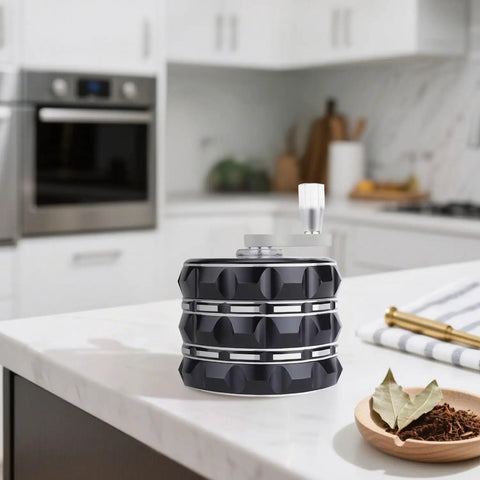 Portable 2.5 Inch Hand Crank Grinder With Clear Top Cover, featured on a kitchen countertop, large aluminum alloy manual grinder.