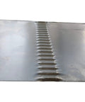 Close-up of formed sheet metal showing linear beads made by Badass Heavy Duty Electric Bead Roller And Sheet Metal Crimper With 8 Inch Throat Depth Built Tough For 18 Gauge Auto Body Fabrication And Power Rolling.