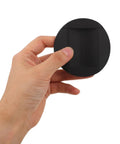 Hand holding Four Pack Anti Slip Rubber Furniture Pads For Chairs And Caster Feet Round Non Skid Protectors For Tile And Marble Floors