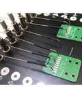 Pro Grade Adjustable Probe Data Repair Tool For PCB Testing And Debugging with stainless steel needles on circuit board