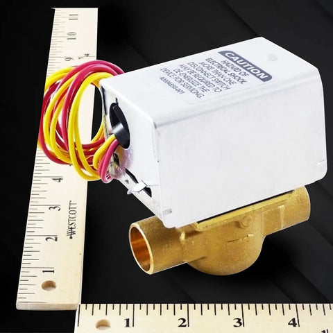 Replacement Motorized Zone Valve For Heating Systems with 3/4 Sweat Connection, shown with rulers for size reference