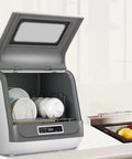 Fully Automatic Countertop Dishwasher With Ultrasonic Scrubbing And Auto Dry, open lid displaying clean dishes and organized glide tray.