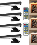 Hassle Free Wireless Picture Light With Remote Control And Adjustable Color Temperature Four Pack on display with artwork.