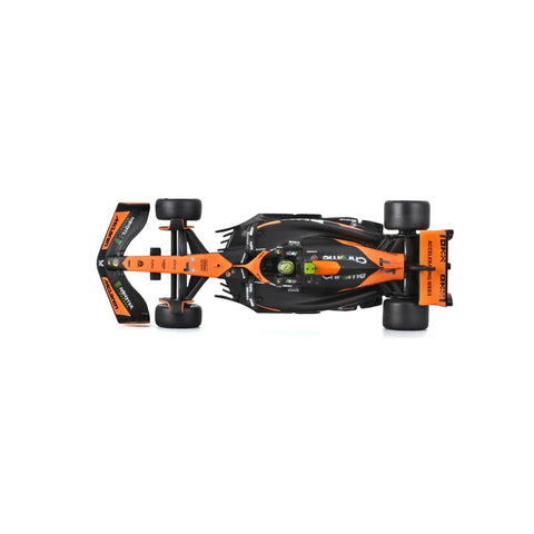 Top view of McLaren MCL38 1:43 Scale 2024 Die-Cast Formula Car With Helmet Display Box And Norris Number Four Lando Norris Collectible