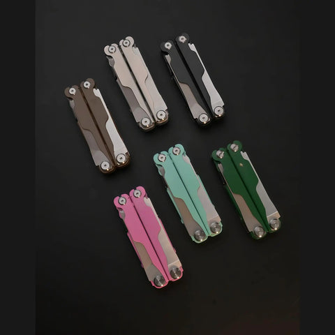 Multiple 20 In 1 EDC Multi Tool Pliers With Spring Loaded Pliers Head Detachable Screwdriver Bits in various colors displayed on black surface