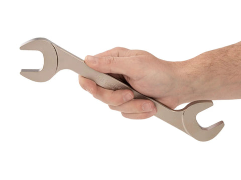 Hand holding 1-1/8 Inch Angle Head Open End Wrench With Dual 30 And 60 Degree Heads For Tight Spaces Model WAE83229