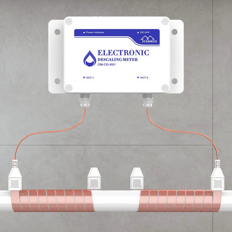 Whole House Salt Free Water Softener Descaler System for Hard Water mounted on wall with copper wiring.