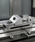 Precision Swivel Vise For Milling And Grinding on CNC machine, sturdy alloy steel, compact design with slip resistant grip.
