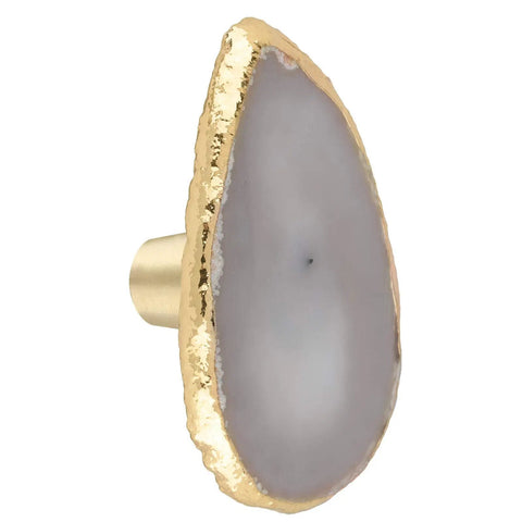 Natural Agate Slice Drawer Knob with Gold Edges, perfect for upgrades. Part of Upgrade Your Cabinets And Dressers With These Slick Natural Agate Slice Geode Drawer Knobs Featuring Plated Gold Edges And Heavy Duty Brass Screws For A Massive Kitchen Glow Up.