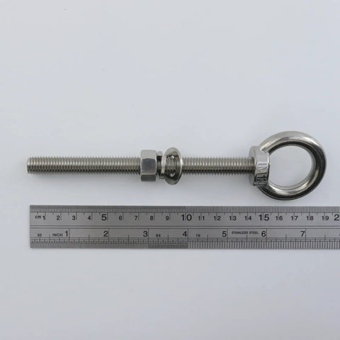 Beefed Up Heavy Duty M12 Threaded Eye Bolts Kit 5 Pcs 304 Stainless Steel With Nuts And Washers next to a ruler for size reference