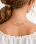 Woman wearing necklace with gold swirl S-hook extender, part of Set Of 4 S Hook Necklace Extenders With Gold And Silver Swirl Hooks