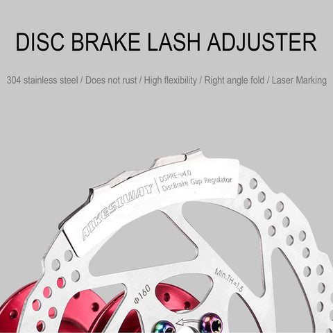 Disc Brake Pad Gap Regulator And Rotor Truing Fork For Bikes, showing tool adjusting bike disc brake rotor