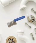 Heavy Duty Stainless Steel Ball Valve With Internal Threaded Fittings For Solid Water Pipe Networks, 1 inch size, with tools and plumbing parts.