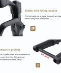 Close-up of 700c Suspension Fork For Road Bikes With Pneumatic Shock Absorption, brake wire fixing buckle and barrel shaft.