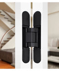 Badass Heavy Duty Hidden Hinge For Wood Doors And Cabinets Self Locking Adjustable Concealed Joint Gold Finish Supports Up To 176 Pounds Works Like A Charm Silent Movement close-up view of black concealed hinge mounted on cabinet.