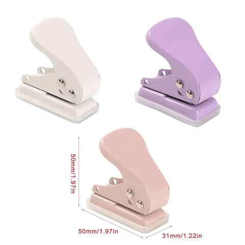 Three pastel-colored metal quarter-inch single hole punchers with 6mm round hole, 10 sheets capacity, for crafts and office projects.