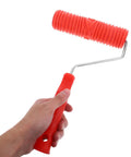 Kick Some Serious Flair Into Your Walls Using This Heavy Duty Ceiling Texture Roller With A Sturdy Plastic Handle To Nail That Perfect Straight Grain Pattern On Drywall Today - Red rubber roller in hand.